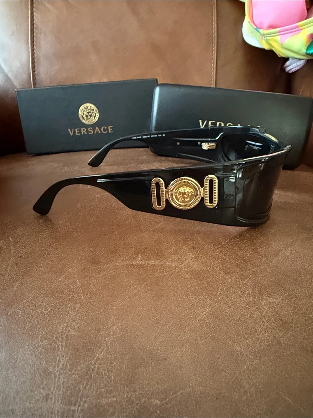 Versace Black Sunglasses with Gold Medallion Accent